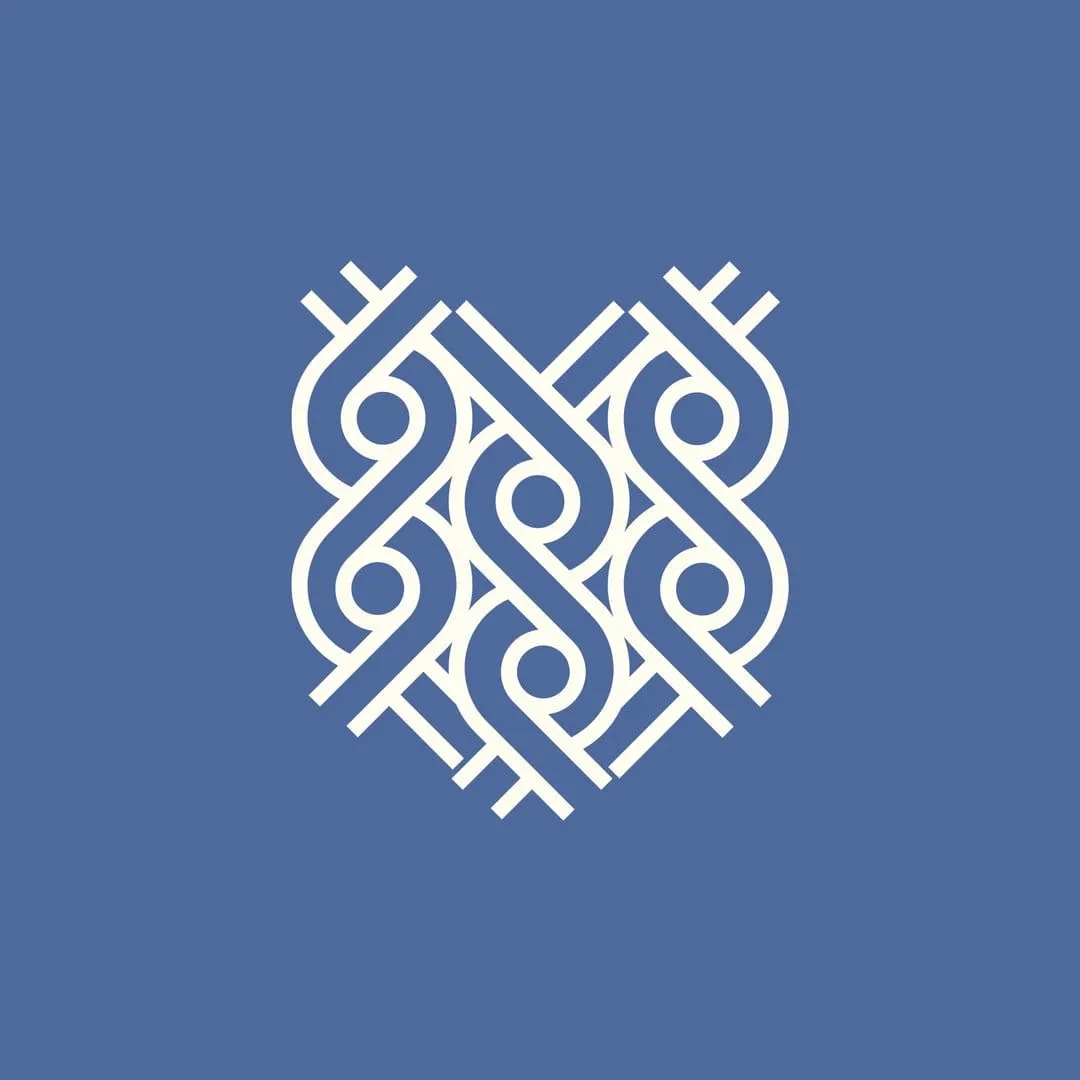 The knit monogram in white on a blue square